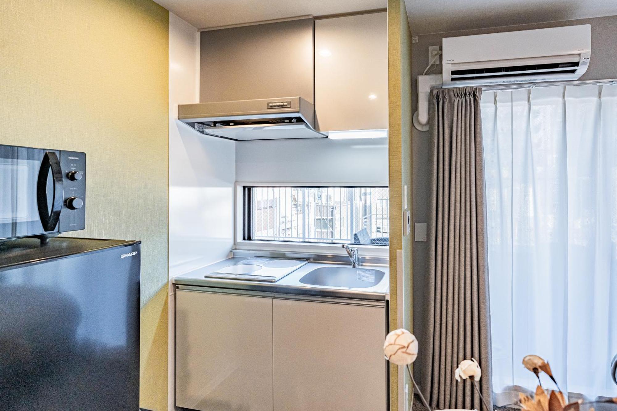 Apartment Hotel 11 Umeda Kamiyama Osaka Dış mekan fotoğraf
